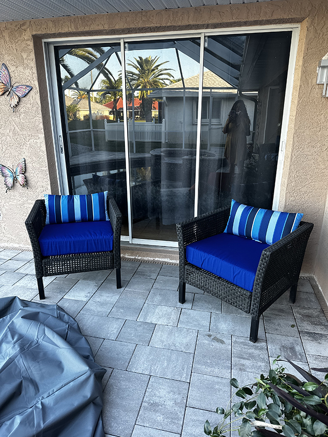 boxed seat cushions in True Blue fabric with lumber pillows in Milano Cabalt