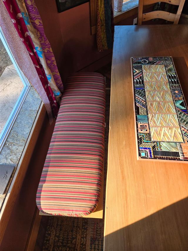 Slightly rounded corners in boxed construction with Sunbrella Dorsett Cherry fabric with 2″ thickness.
