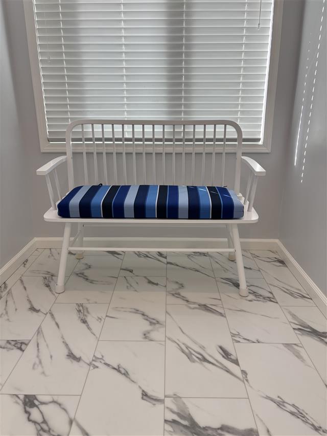 1 custom bench cushion - slightly rounded back corners - set in waterfall construction with Sunbrella Milano Cobalt fabric, polyurethane foam with fiber batting, 2 ties at back