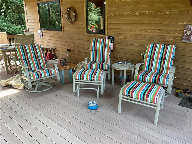 3 custom chair cushions - channeled with square corners - set in boxed construction with Sunbrella Carousel Confetti fabric, polyurethane foam with fiber batting, ties at hinge and side of back

2 custom ottoman cushions - plain with square corners - set in boxed construction with Sunbrella Carousel Confetti fabric, polyurethane foam with fiber batting, no ties
