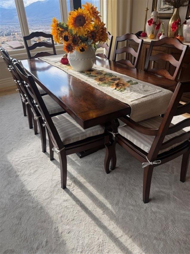 Custom trapezoid seat cushions set in boxed construction with Sunbrella Tranquil Linen fabric, polyurethane foam with fiber batting, ties