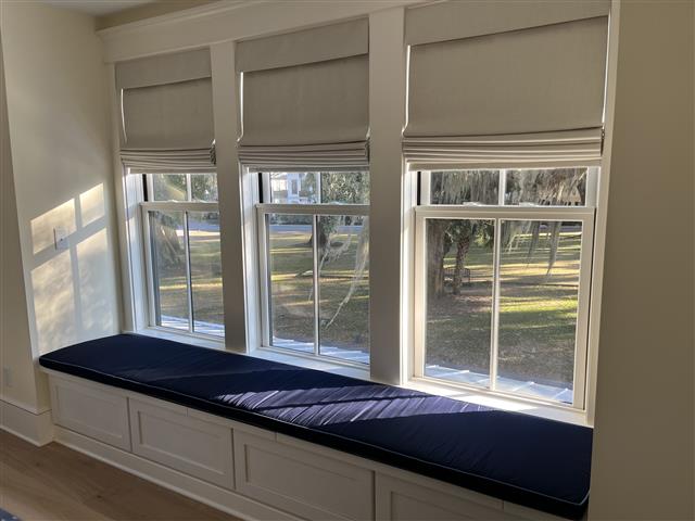 Custom Bench Cushion- made in boxed construction, with Sunbrella Navy fabric with Sunbrella Sapphire Blue trim, polyurethane foam with fiber batting, no ties, with 2 inches thick