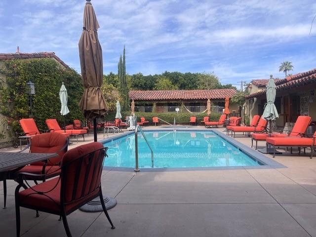 Custom chaise cushions - plain with square corners - set in boxed construction with Sunbrella Dupione Papaya fabric, polyurethane foam with fiber batting, ties at hinge and sides of back.