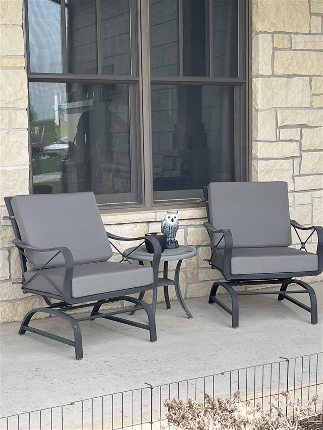 Custom deep seating chair cushions set in boxed construction with Sunbrella Charcoal fabric, polyurethane foam with fiber batting, ties at seat cushion's rear corners and sides of back cushion