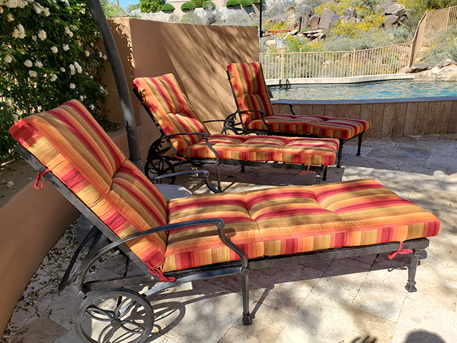 3 custom chaise cushions with tufted square corners made in Sunbrella Astoria Sunset Fabric.