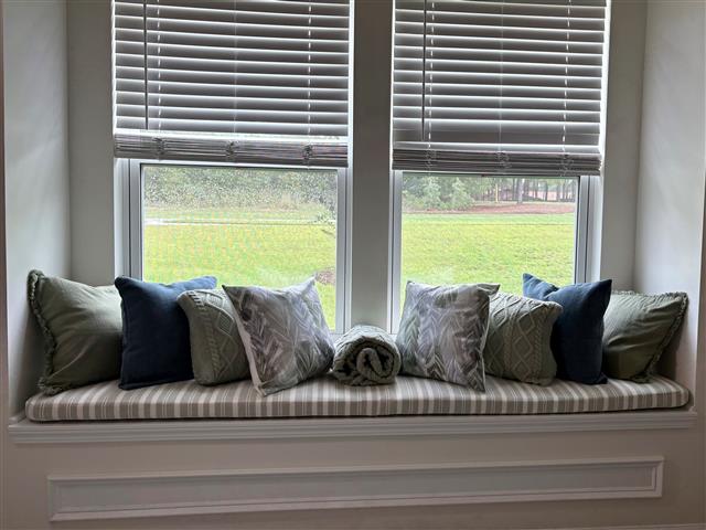 1 custom bench cushion - rounded corners - slightly rounded corners - set in boxed construction with Sunbrella Tranquil Sage fabric, polyurethane foam with fiber batting, no ties